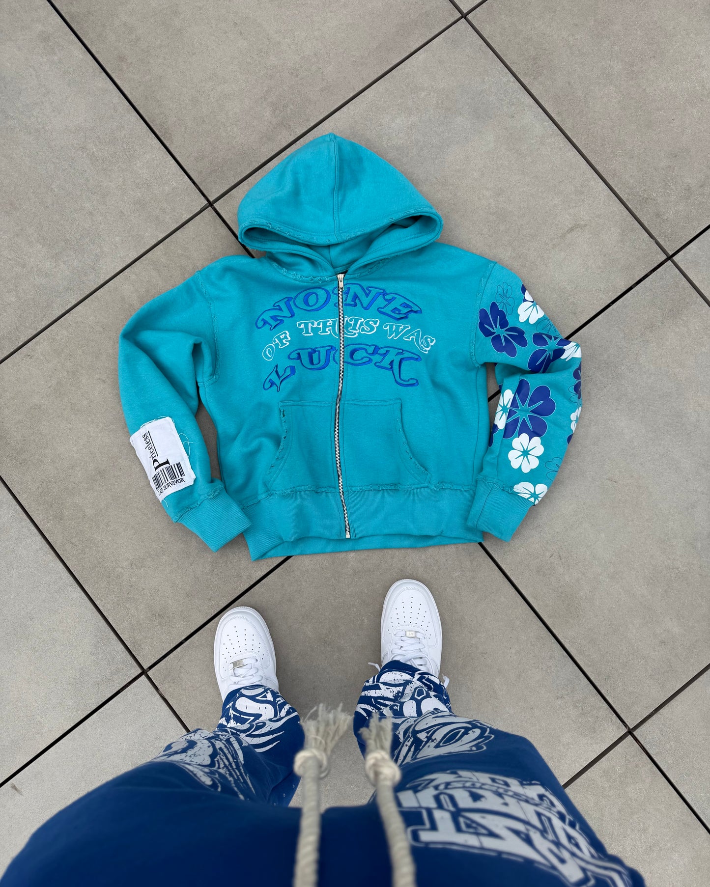 “NONE LUCK” AQUA